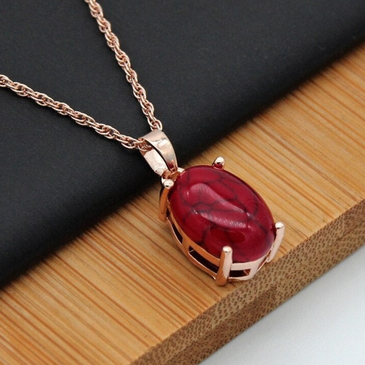 Ensemble de bijoux avec une pierre colorée