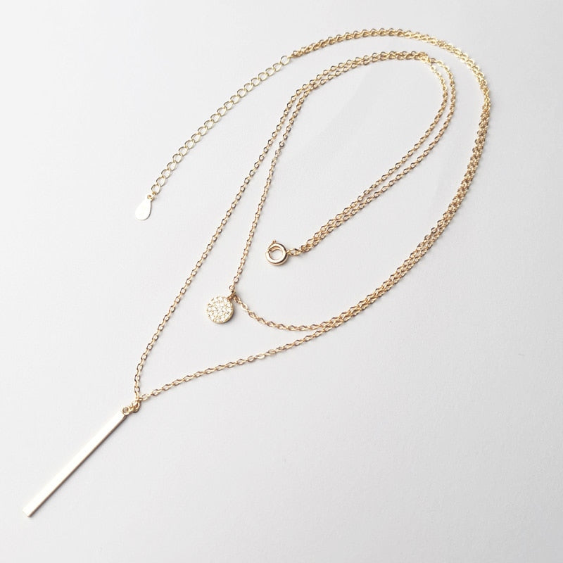 Collier double avec pendentifs