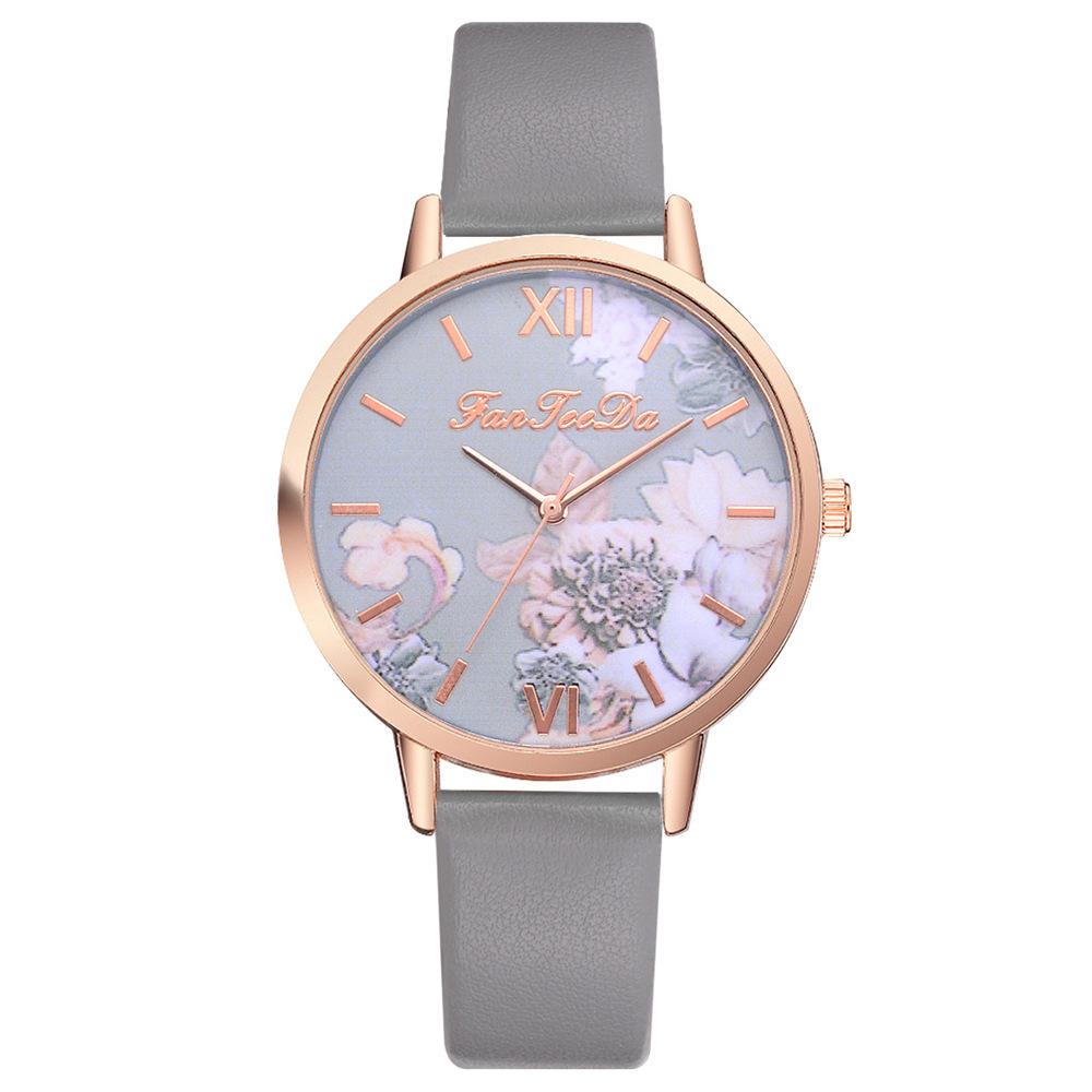 Montre à quartz pour femmes avec motif de fleur