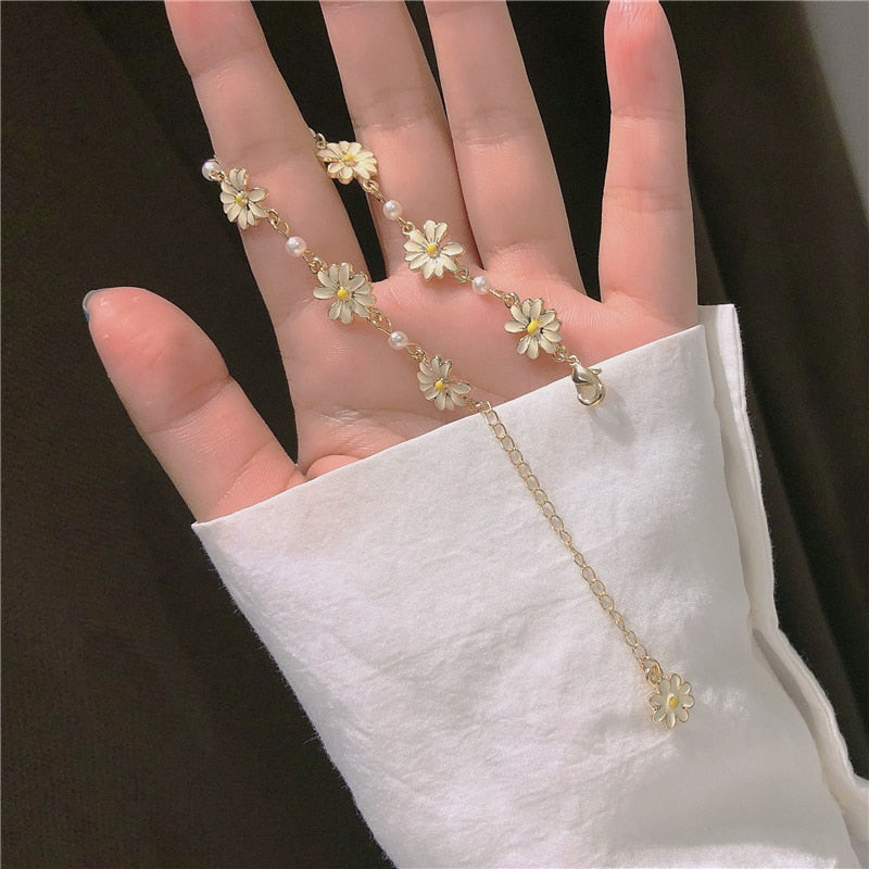 Bracelet avec un motif de marguerite