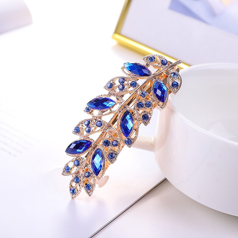 Pince à cheveux avec zircons - brindille avec feuilles
