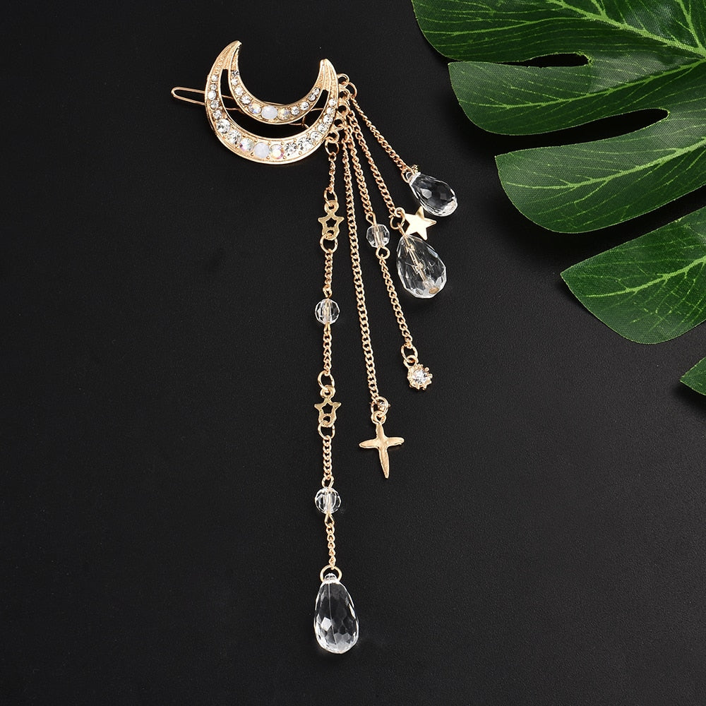 Pince à cheveux en forme de lune avec des perles suspendues