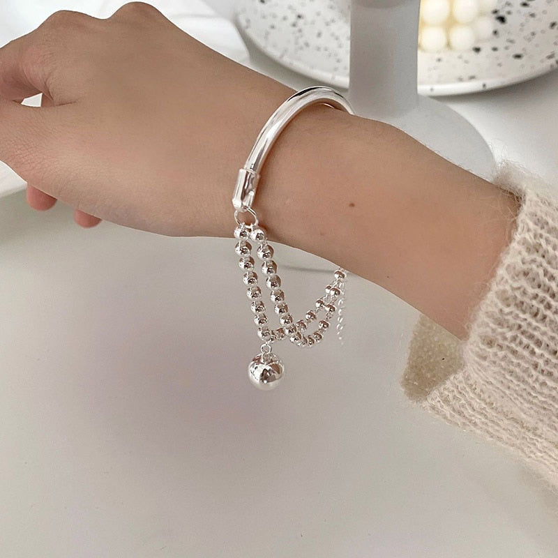 Bracelet avec pendentif en forme de boule