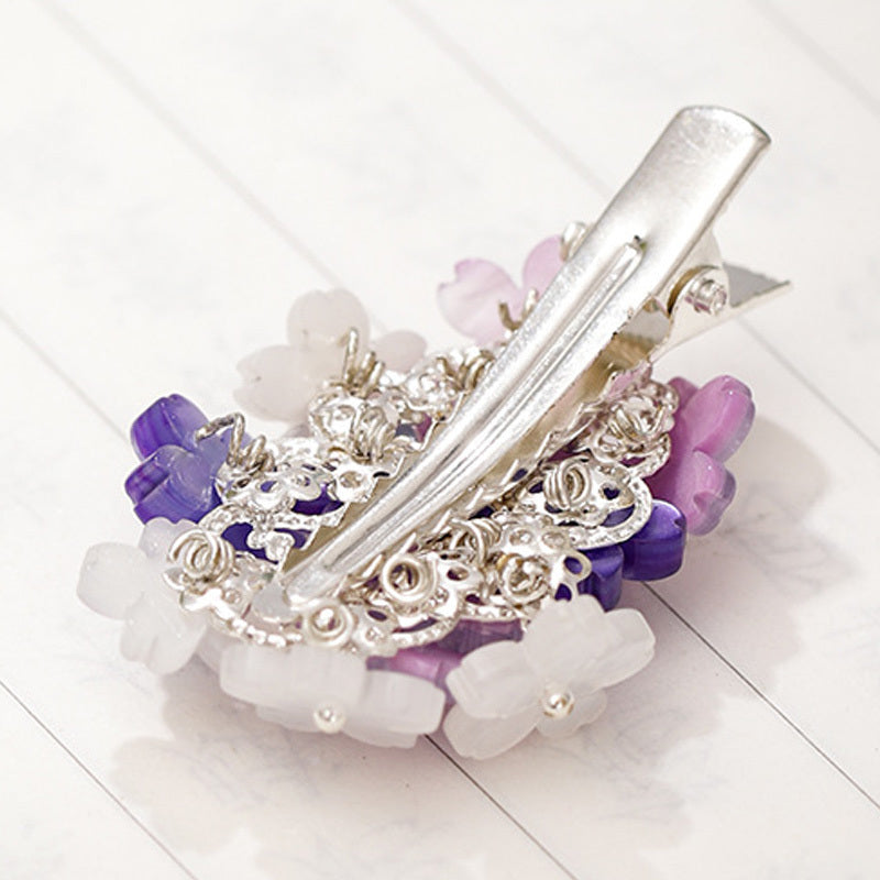 Épingles à cheveux avec des fleurs violettes