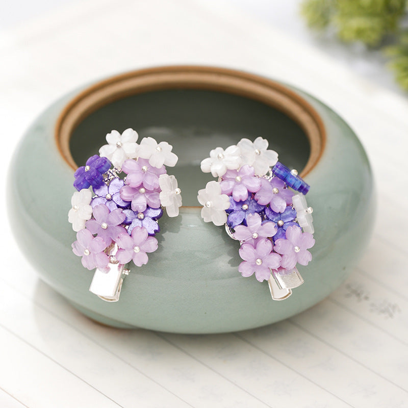 Épingles à cheveux avec des fleurs violettes