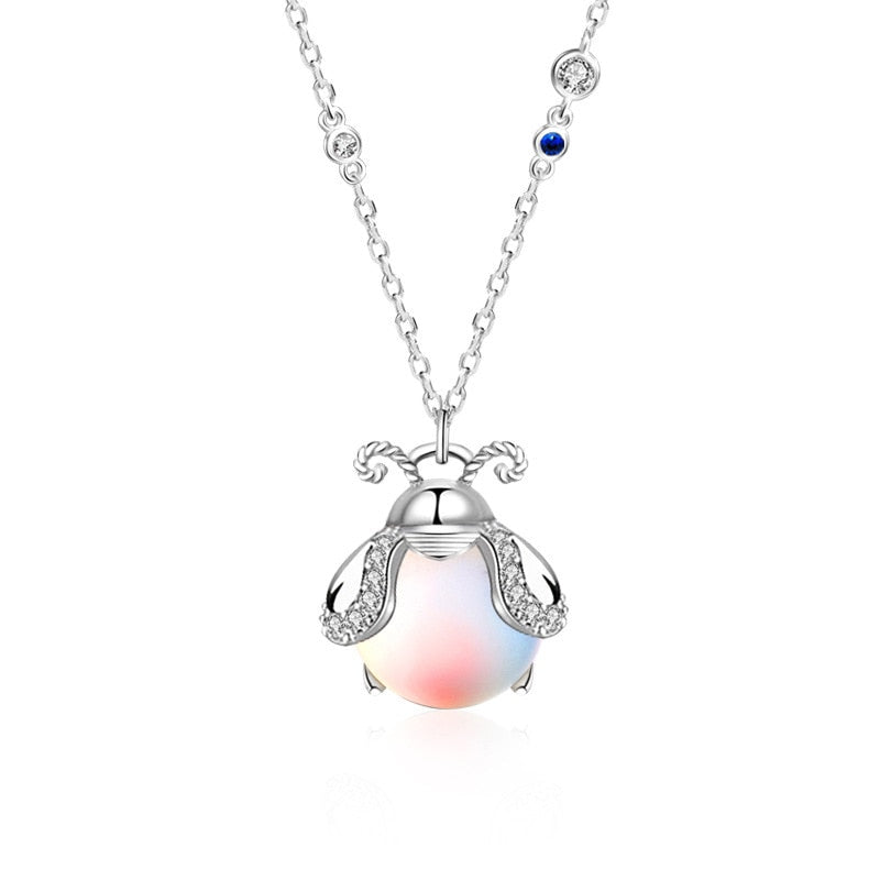 Collier avec un pendentif - luciole