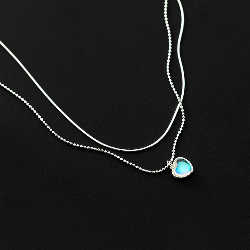 Collier double avec pendentif en forme de cœur