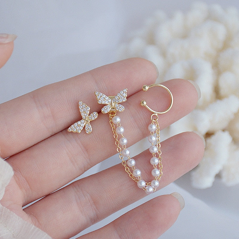 Boucles d'oreilles avec un motif de papillon