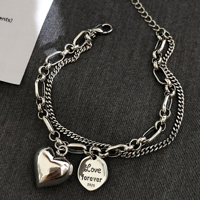 Double bracelet with pendants -> Double bracelet avec pendentifs