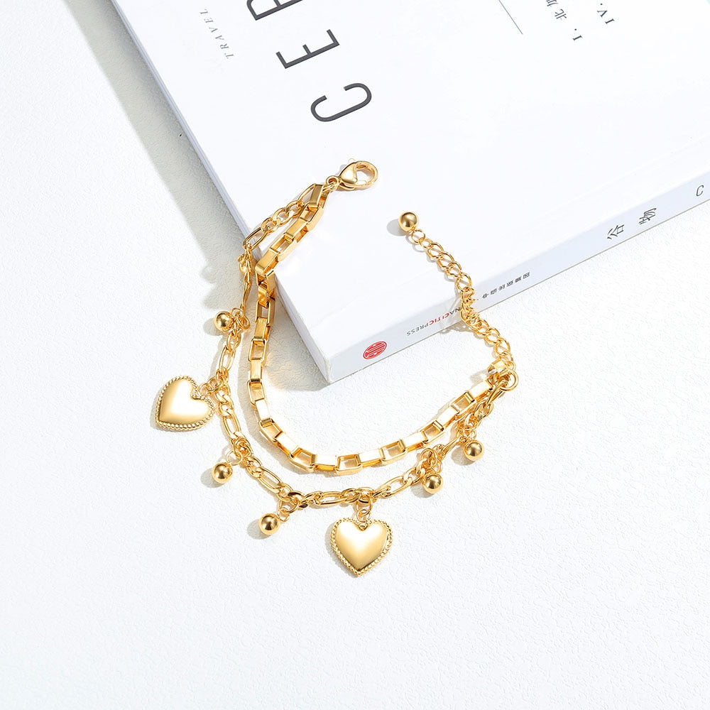 Bracelet avec pendentifs - cœurs