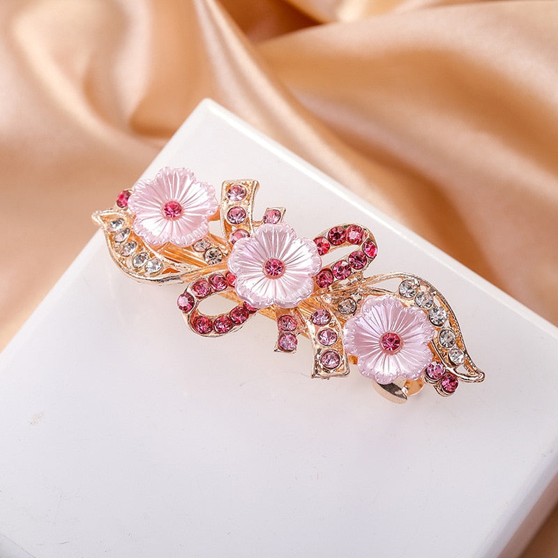 Barrette à cheveux avec des marguerites