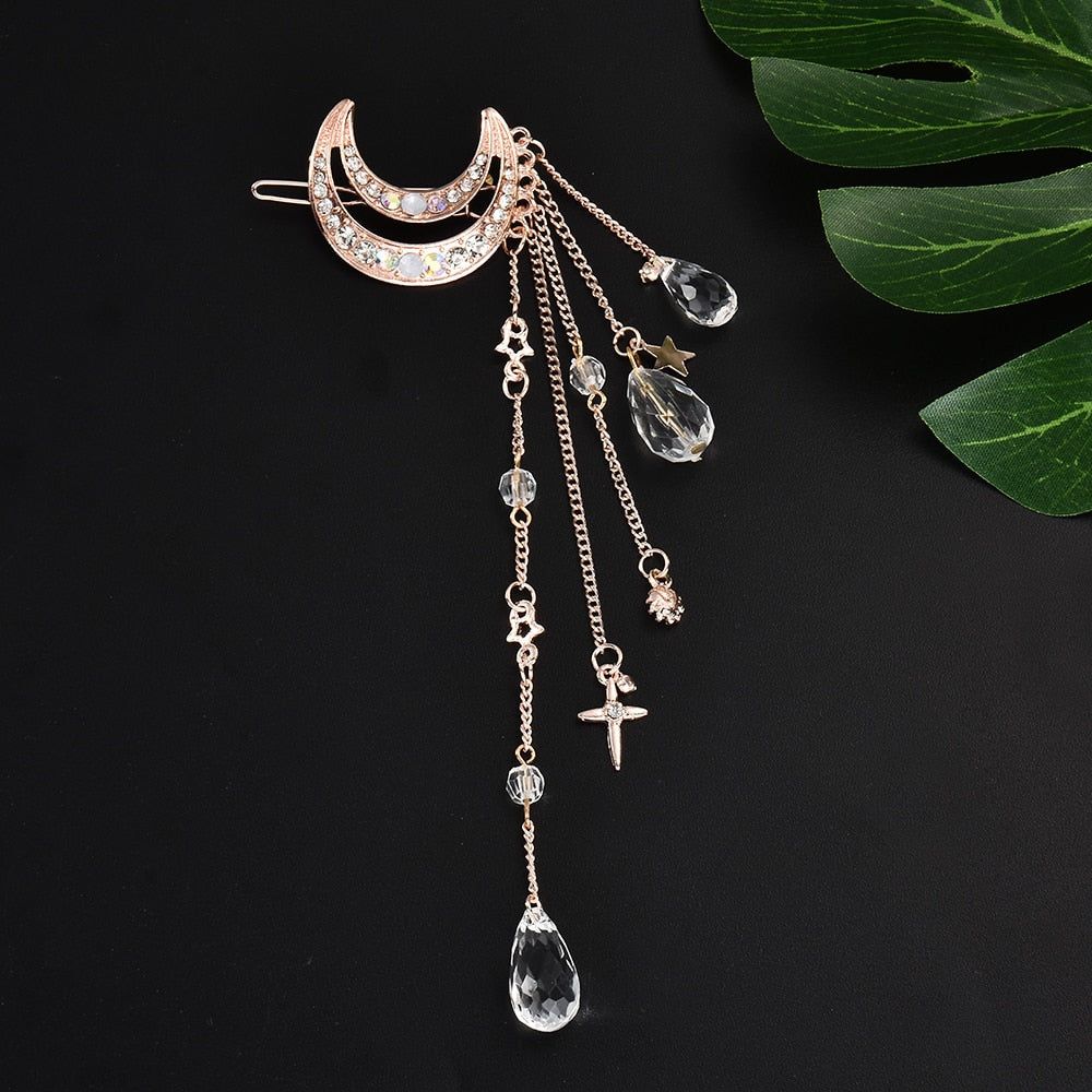Pince à cheveux en forme de lune avec des perles suspendues
