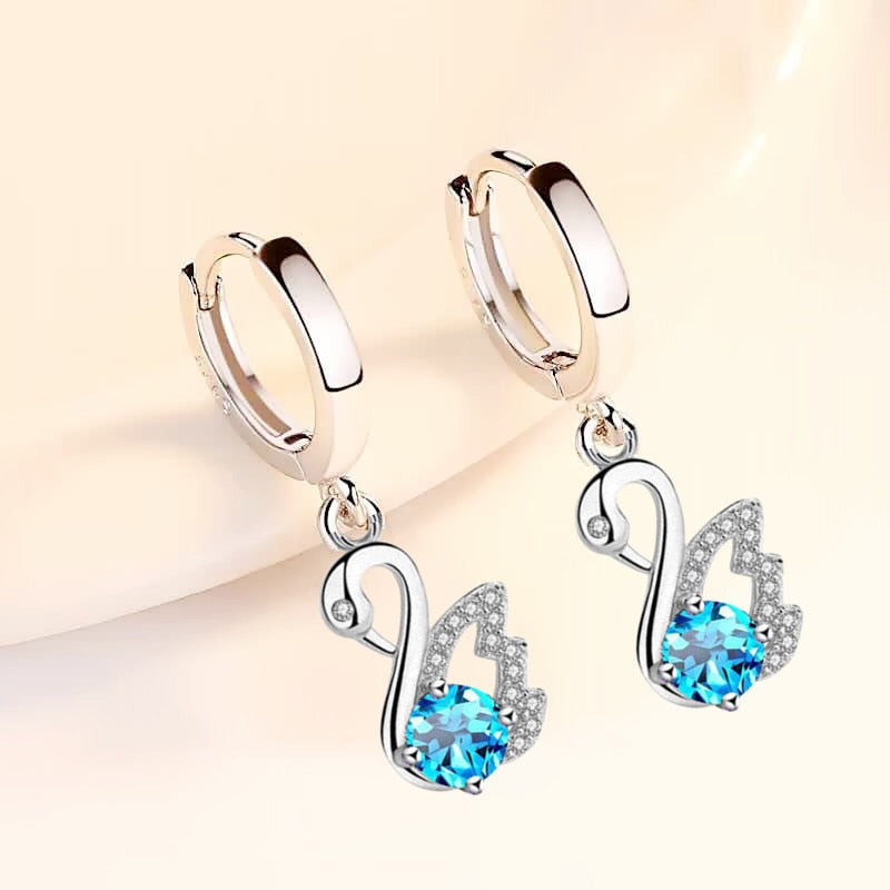Boucles d'oreilles avec un motif de cygne