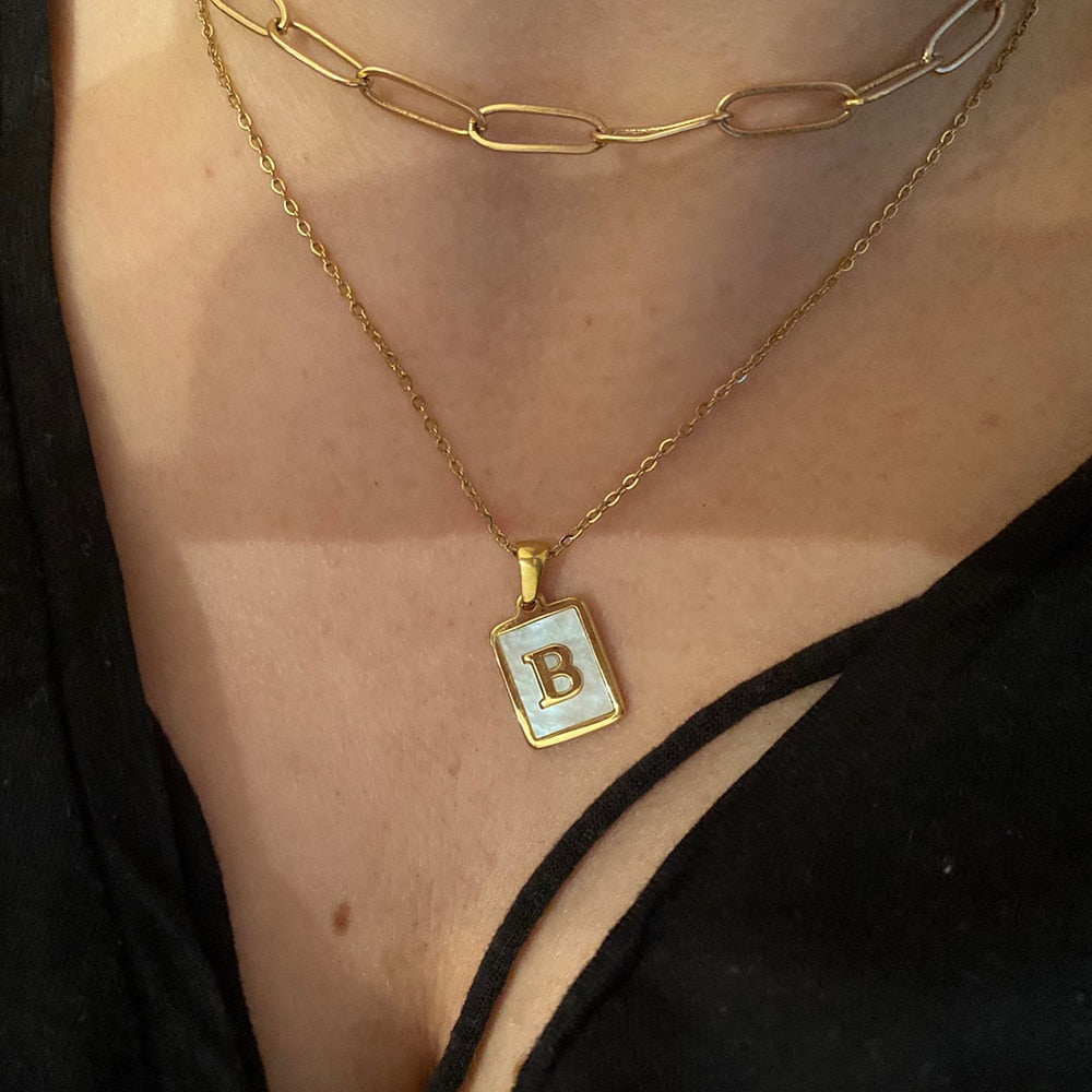 Collier initial