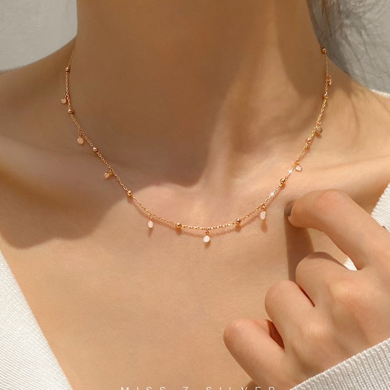 Collier avec de petits pendentifs