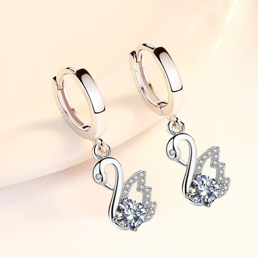 Boucles d'oreilles avec un motif de cygne