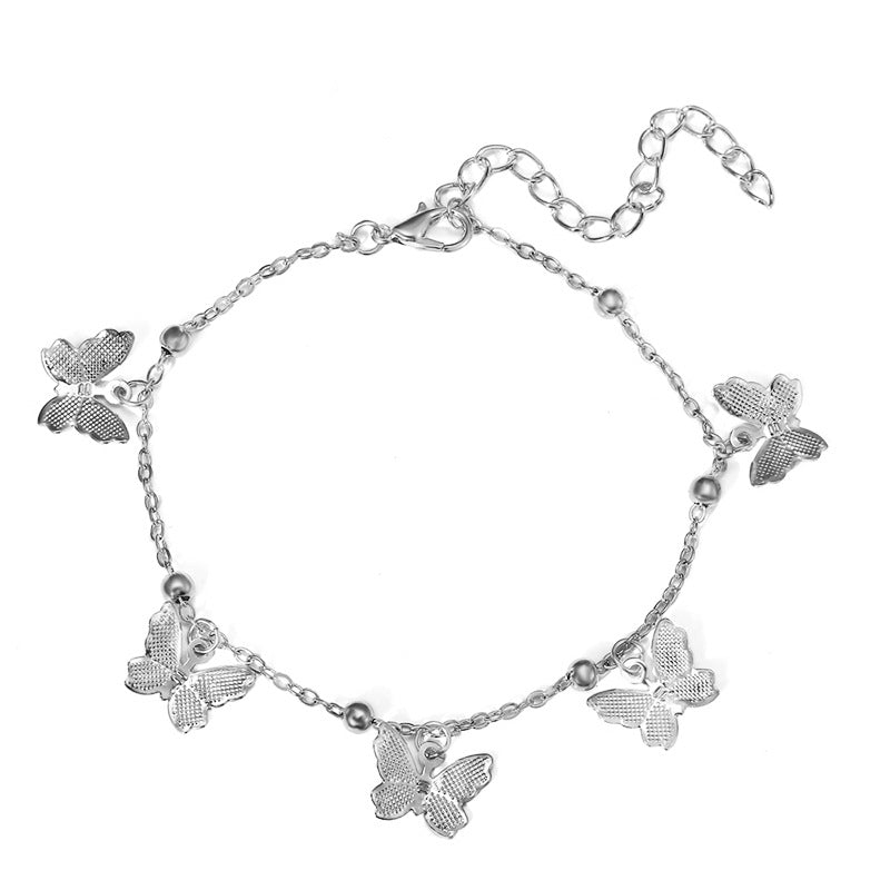 Bracelet de cheville avec pendentifs papillon