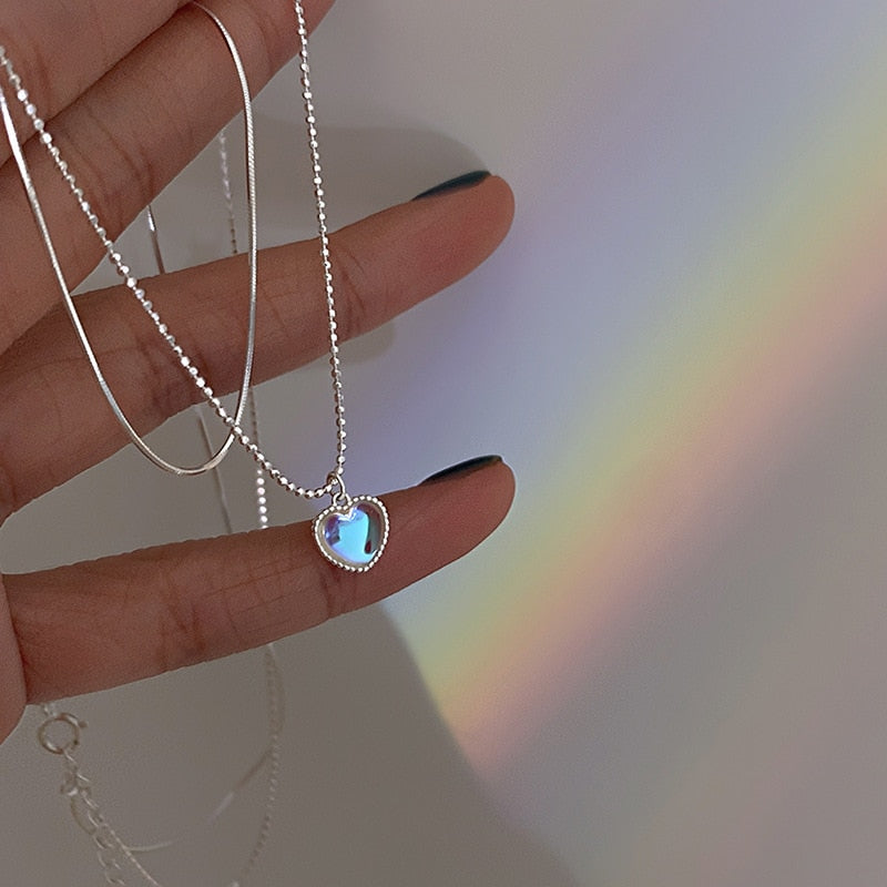 Collier double avec pendentif en forme de cœur