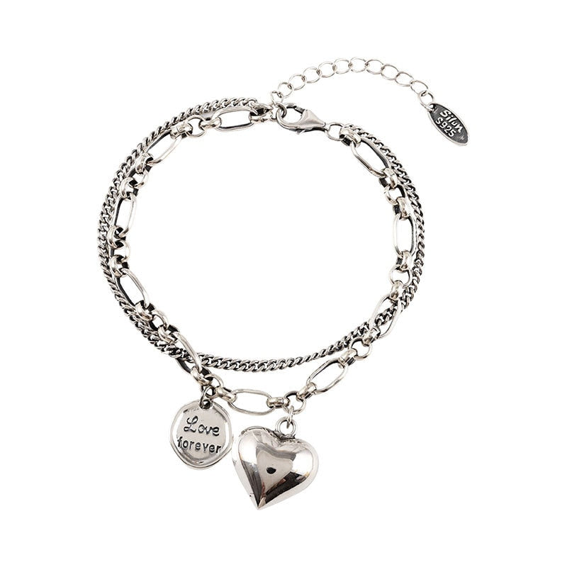 Double bracelet with pendants -> Double bracelet avec pendentifs