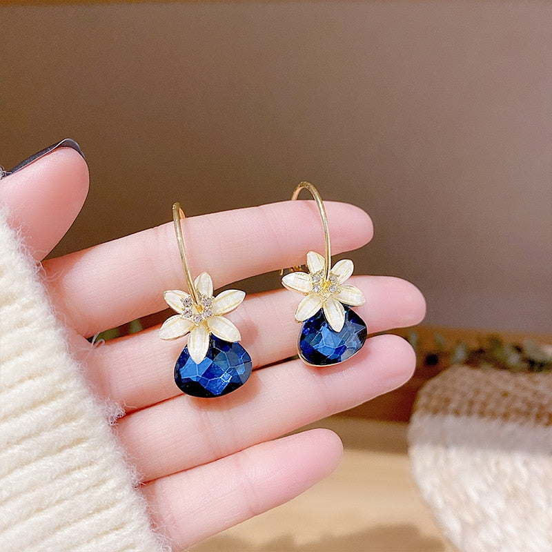 Boucles d'oreilles avec motif floral
