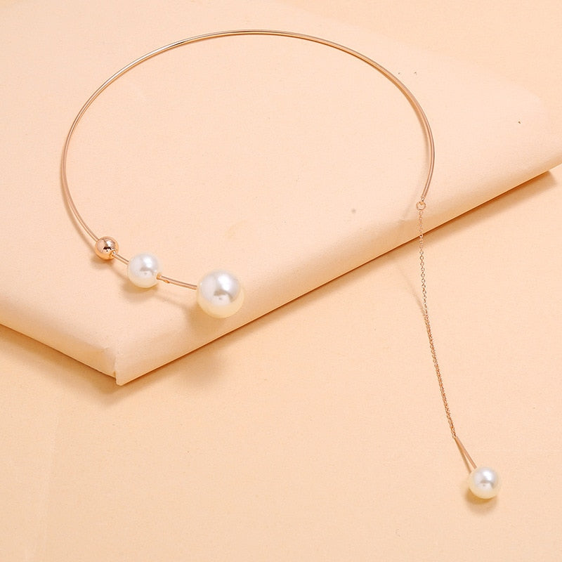 Collier ouvert avec des perles
