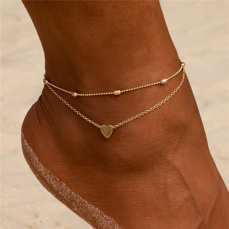 Double bracelet de cheville avec un cœur