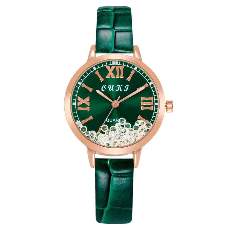 Montre pour femmes avec des cristaux décoratifs sur le cadran