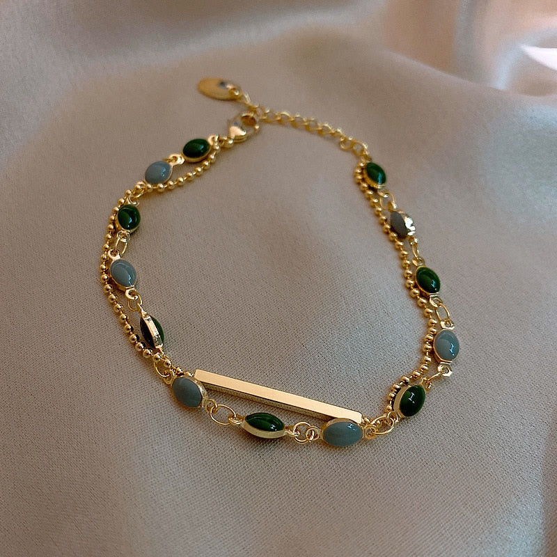 Double bracelet avec des pierres d'imitation