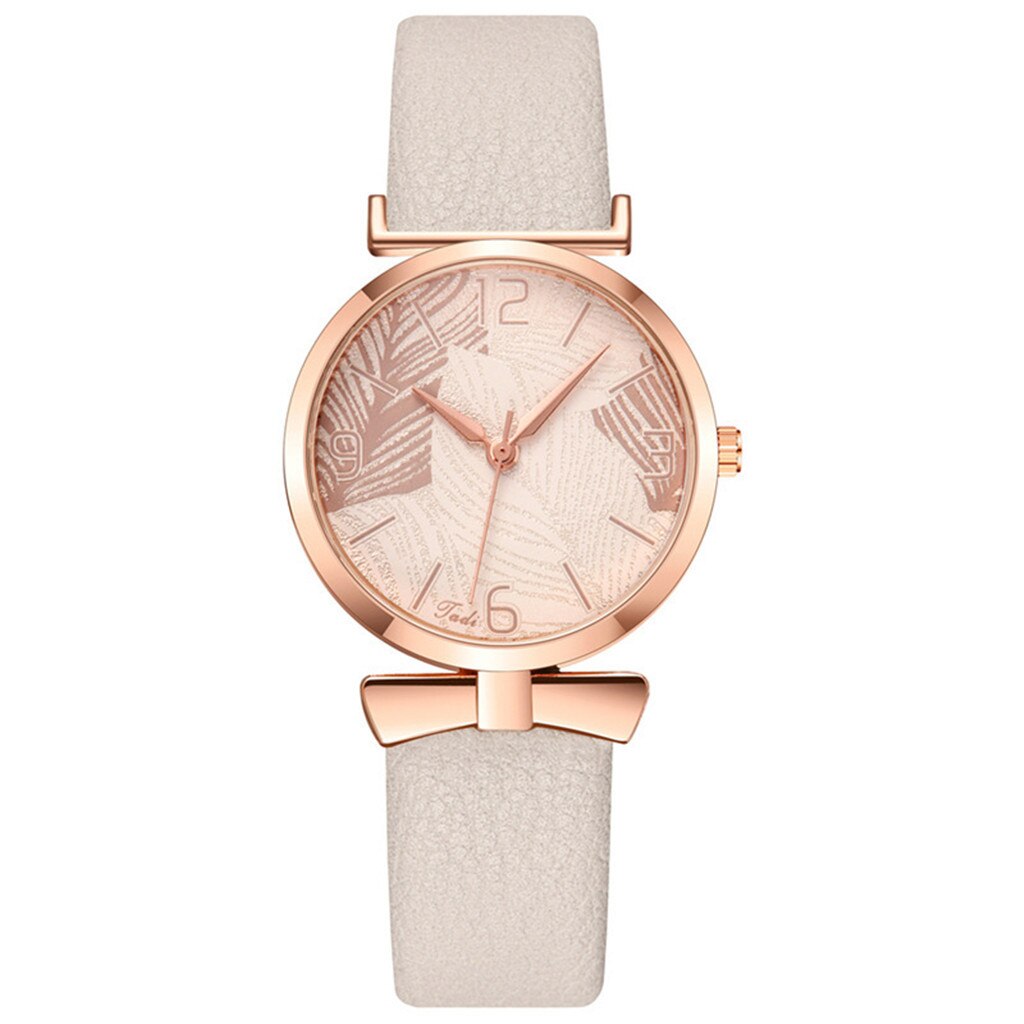 Montre pour dames minimaliste avec motif de feuille