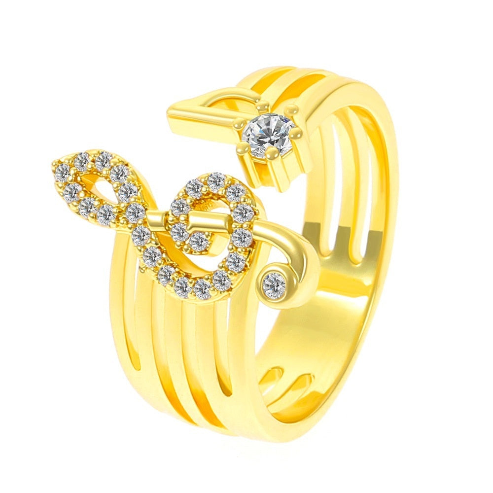 Une bague brillante avec une clé de sol
