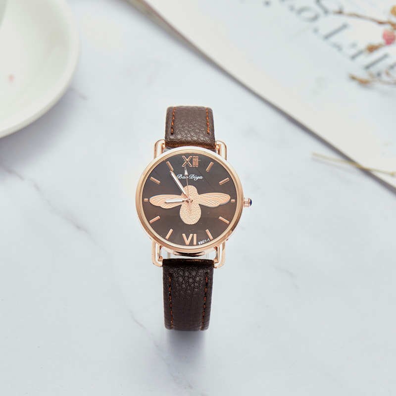 Montre pour dames avec motif d'abeille.