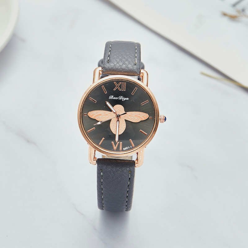 Montre pour dames avec motif d'abeille.