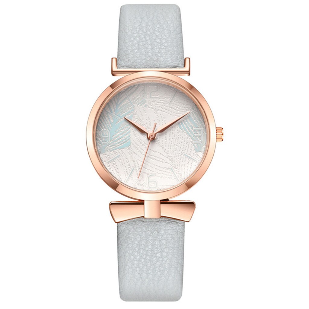 Montre pour dames minimaliste avec motif de feuille