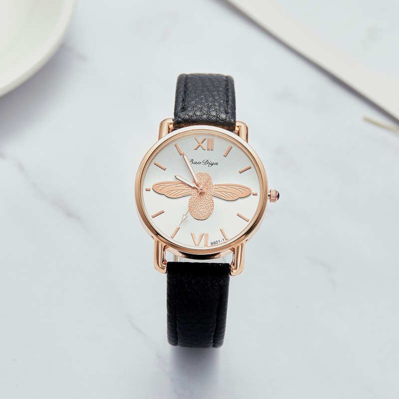 Montre pour dames avec motif d'abeille.