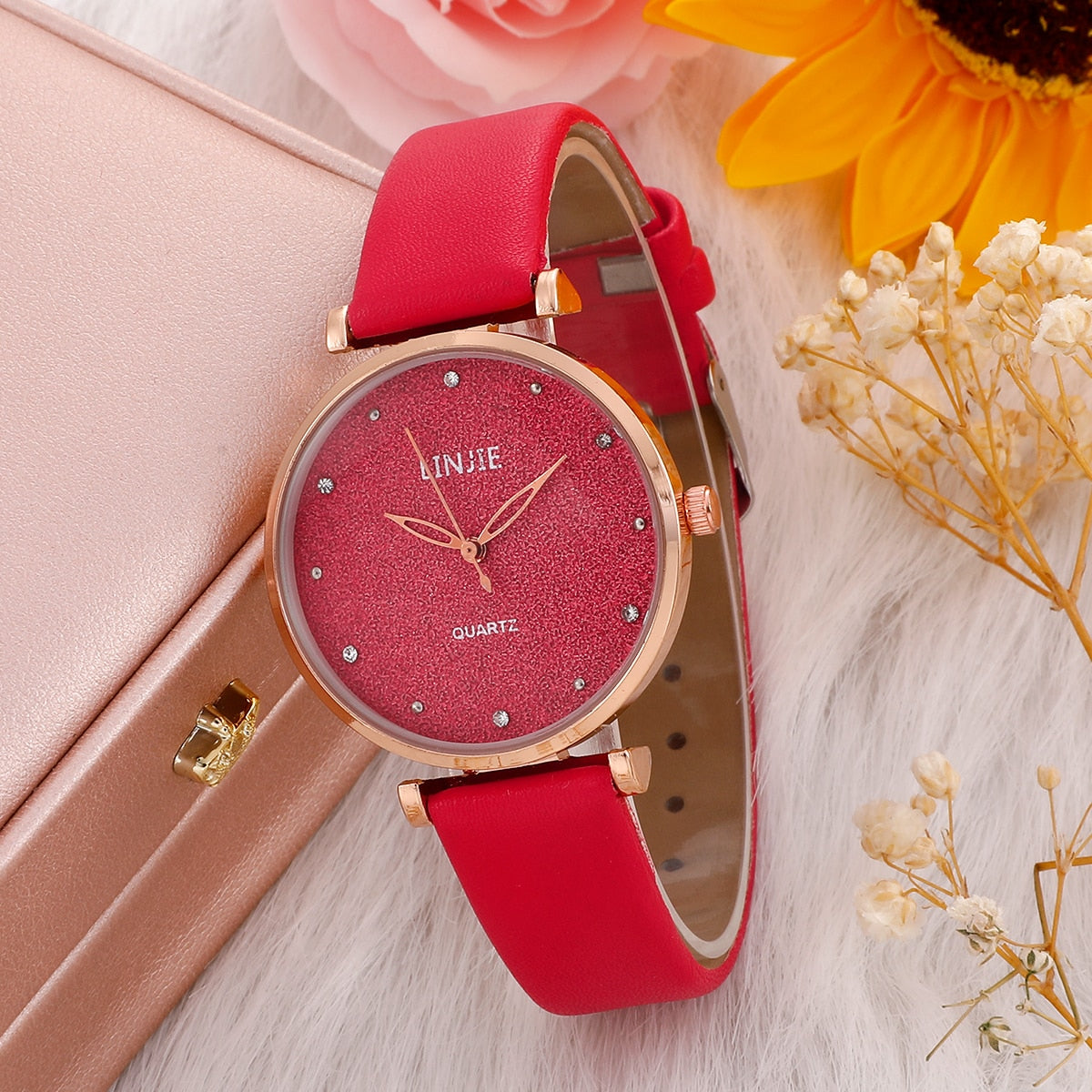 Montre pour dames avec un cadran étincelant