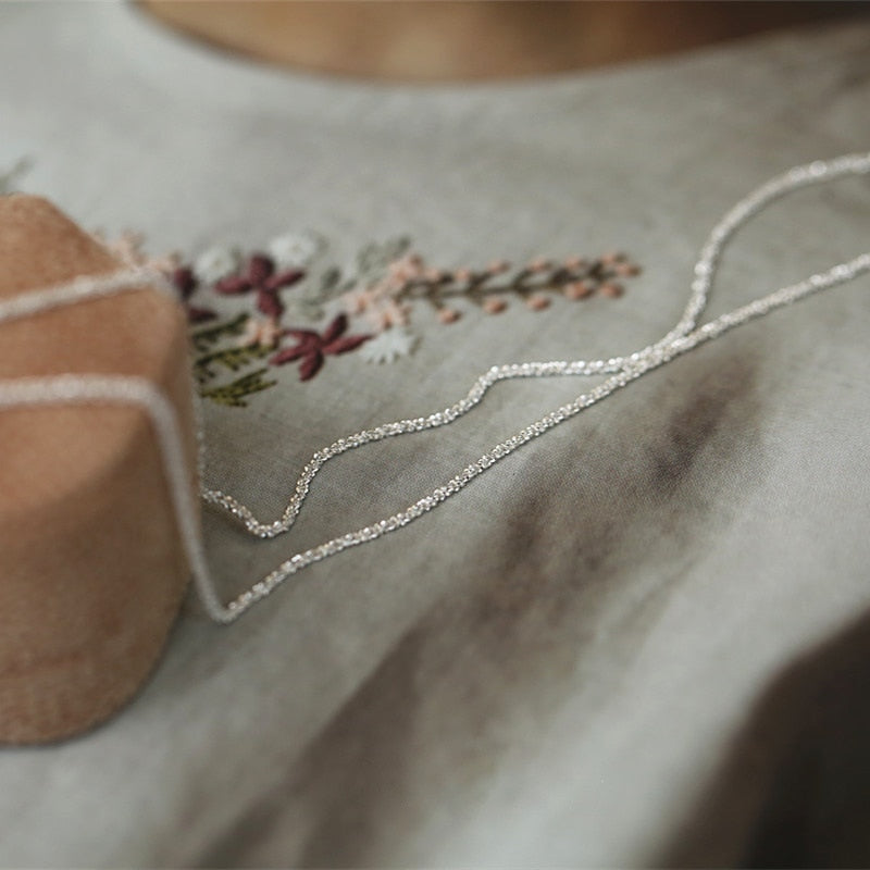 Collier minimaliste avec un œillet