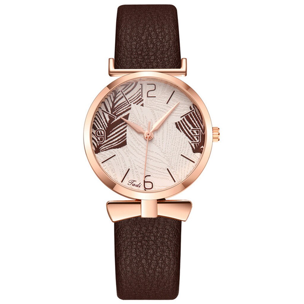 Montre pour dames minimaliste avec motif de feuille