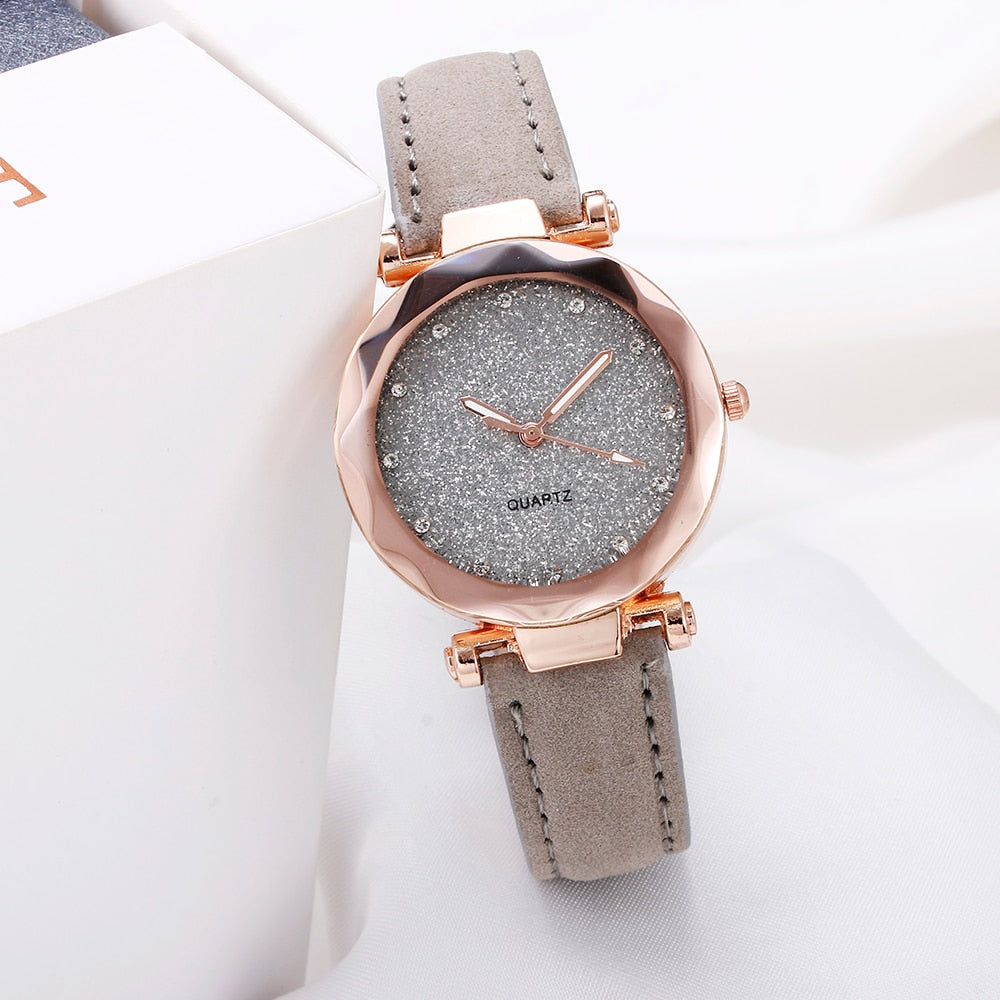 Montre pour dames avec un cadran scintillant sur un bracelet