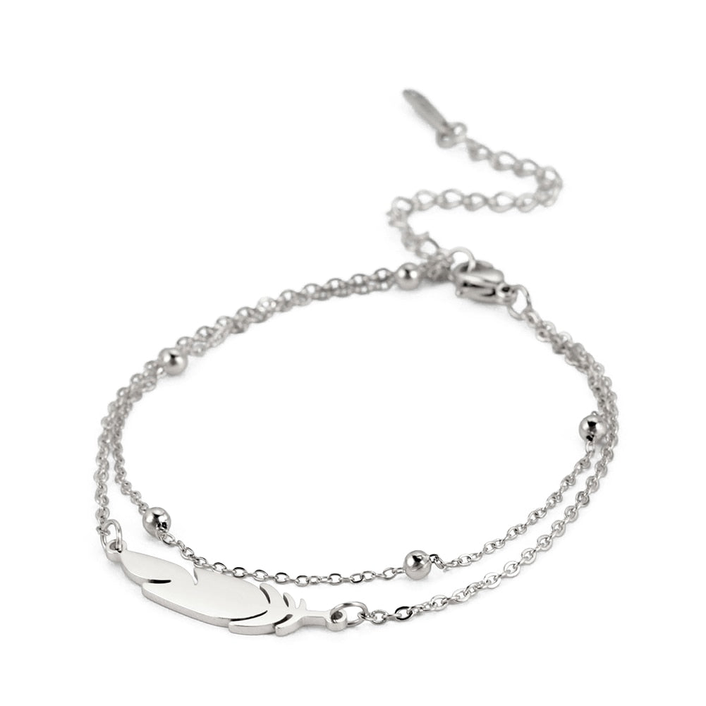 Bracelet de cheville avec une plume
