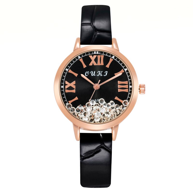 Montre pour femmes avec des cristaux décoratifs sur le cadran