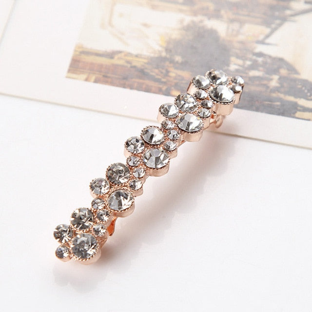 Pince à cheveux longs avec zircons