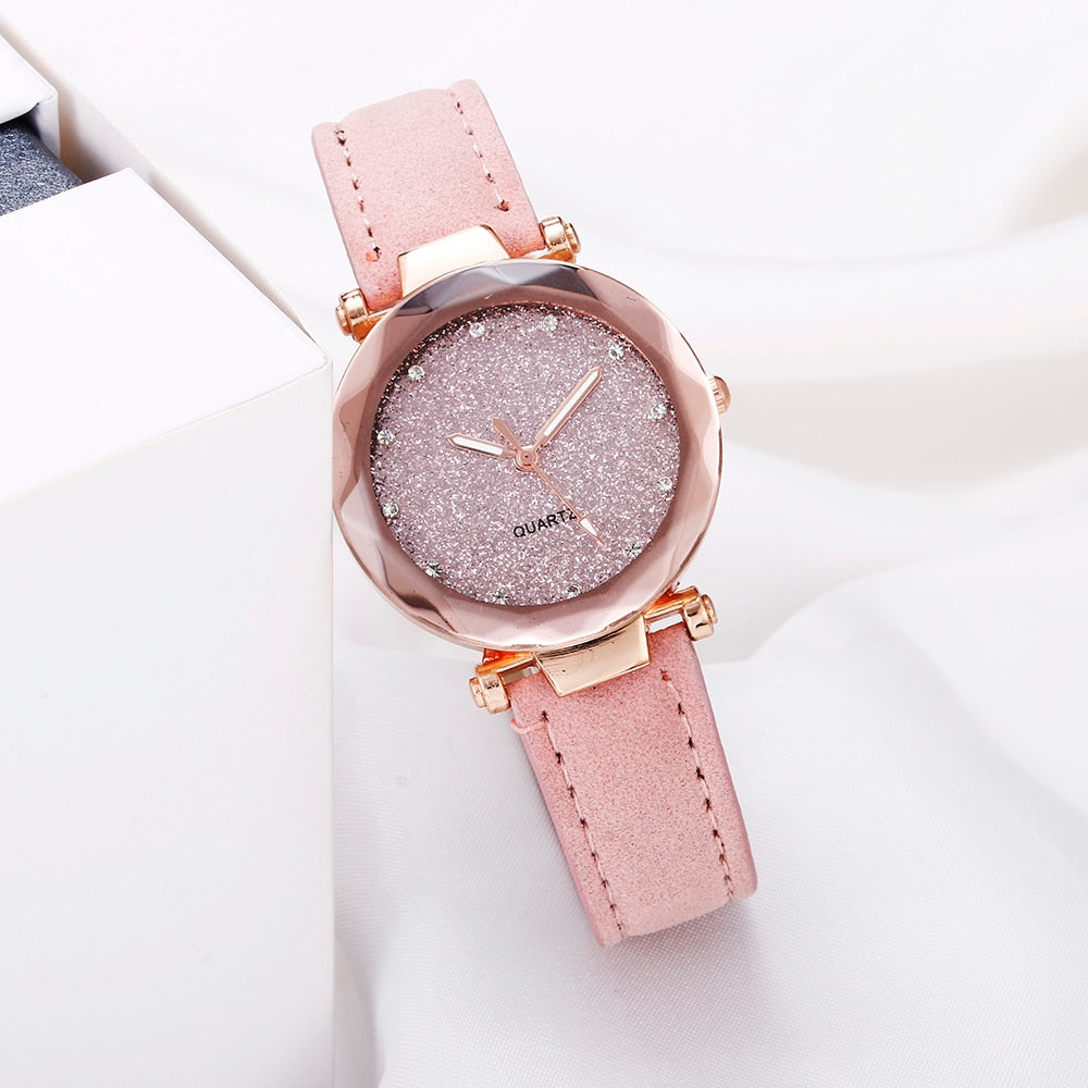 Montre pour dames avec un cadran scintillant sur un bracelet