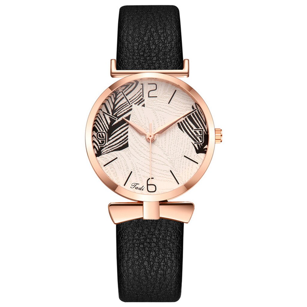 Montre pour dames minimaliste avec motif de feuille