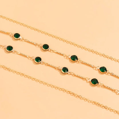 Chaîne pour taille avec des yeux verts