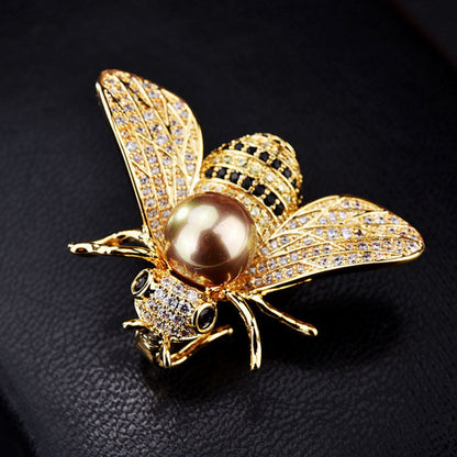 Broche avec une imitation de perle - abeille