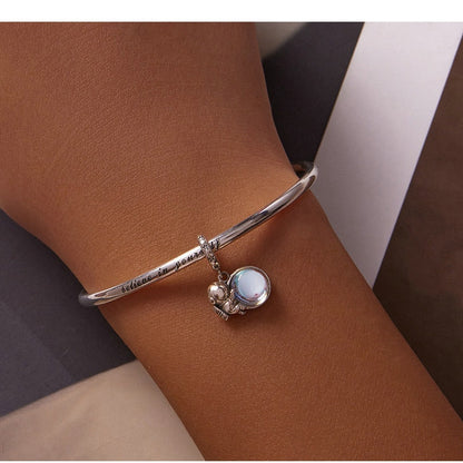Pendentif modulaire - Astronaute sur une planète