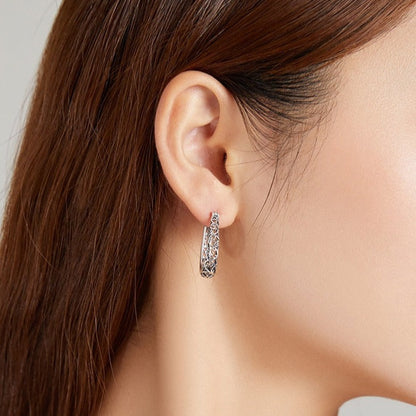 Boucles d'oreilles suspendues ajourées