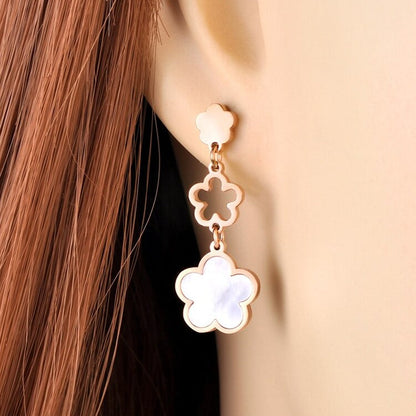 Boucles d'oreilles avec motif de fleur