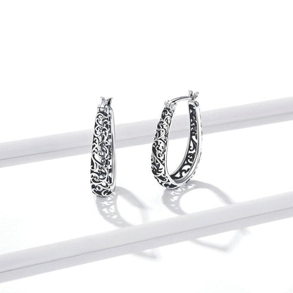 Boucles d'oreilles suspendues ajourées