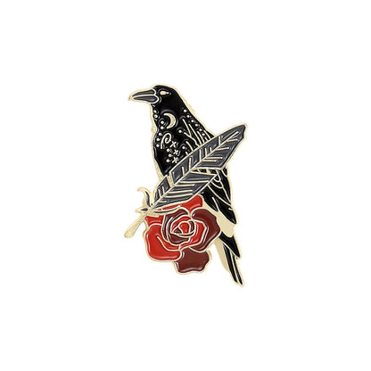 Broche - corbeau avec une rose